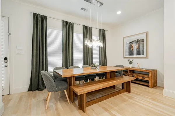 a view of living room filled with furniture and window