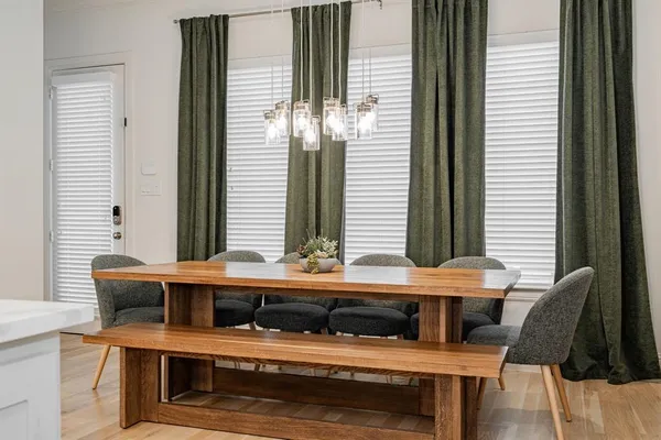 a view of a livingroom with furniture and window