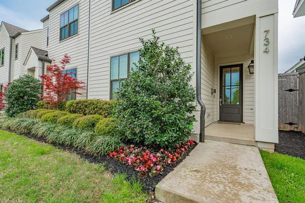 a front view of a house with a porch