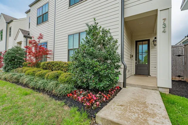 a front view of a house with a porch