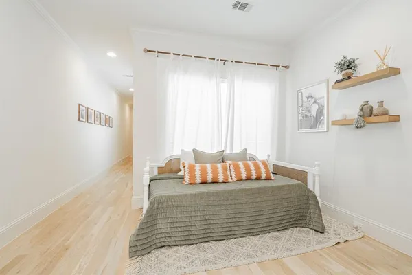 a bathroom with a shower and a sink