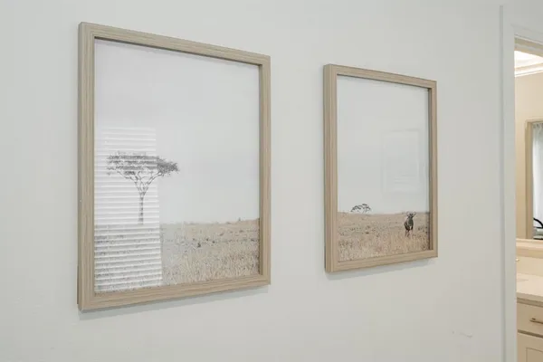 a spacious bedroom with a bed and a window