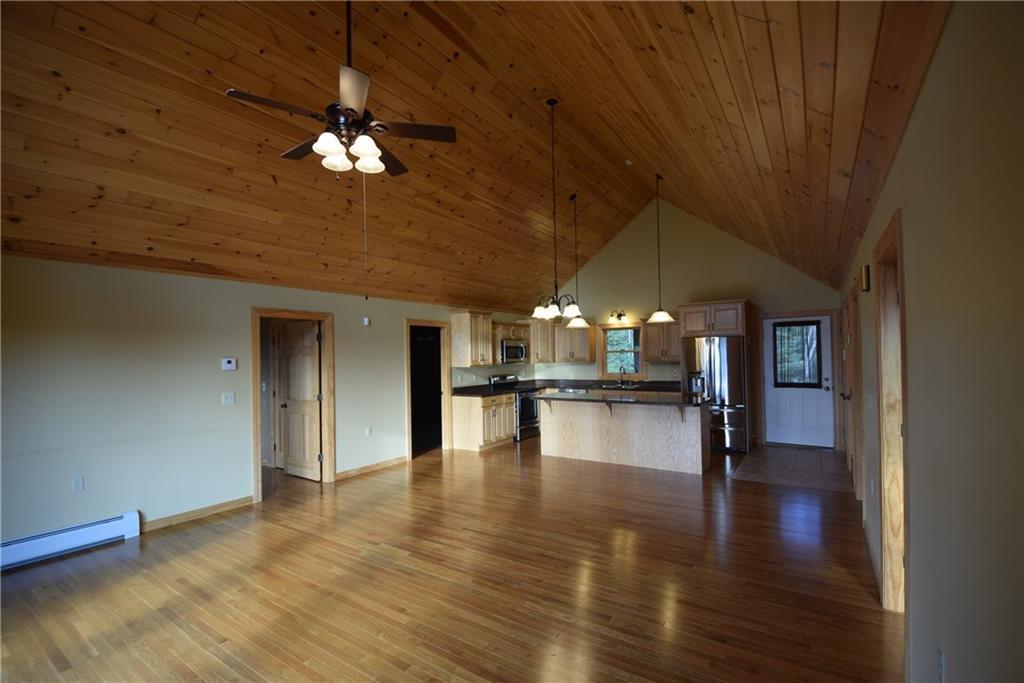 249 B Owlsboro Road Mount Chase, ME 04765 - Photo 9 of 18 Living room area looking toward the...