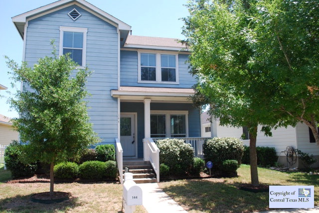 144 Sampson Kyle, TX 78640 - Photo 1 of 1 a front view of a house with garden