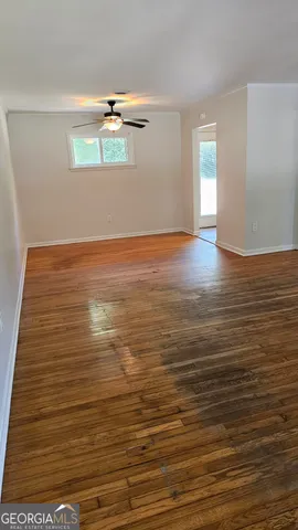 a view of room and wooden floor