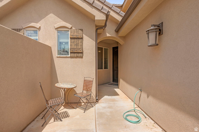 4257 Razor Drive Washington, UT 84780 - Photo 51 of 58 Entry courtyard featuring stucco walls and concrete flooring