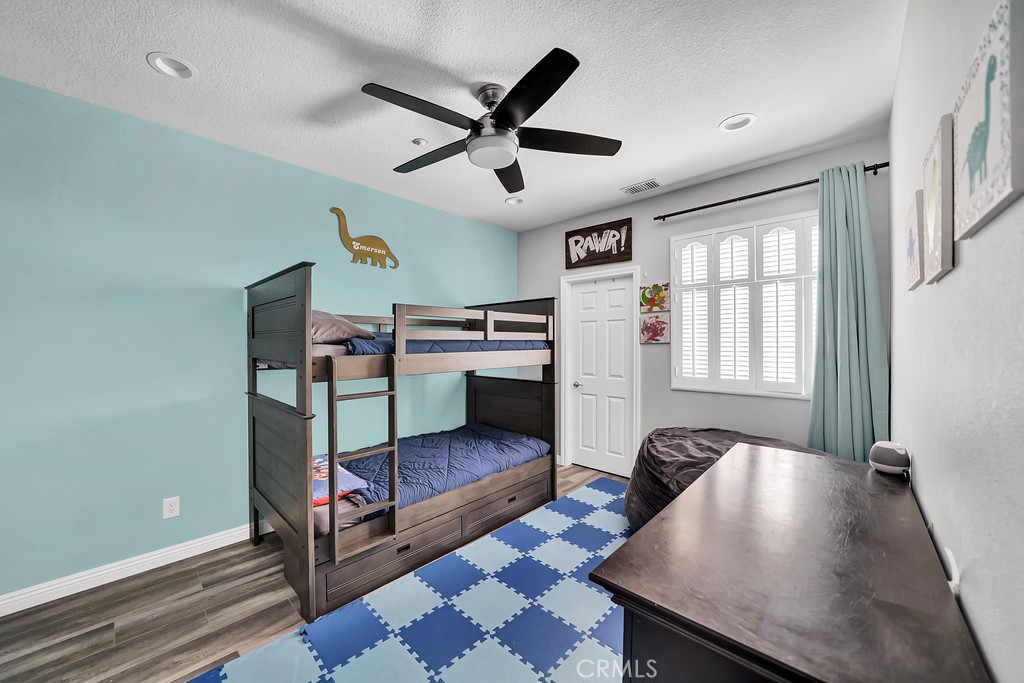 12 Geranium Irvine, CA 92618 - Photo 11 of 20 a living room with a couch