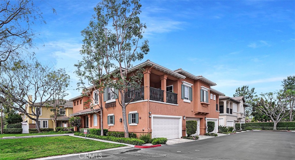 12 Geranium Irvine, CA 92618 - Photo 17 of 20 a front view of a house with a yard