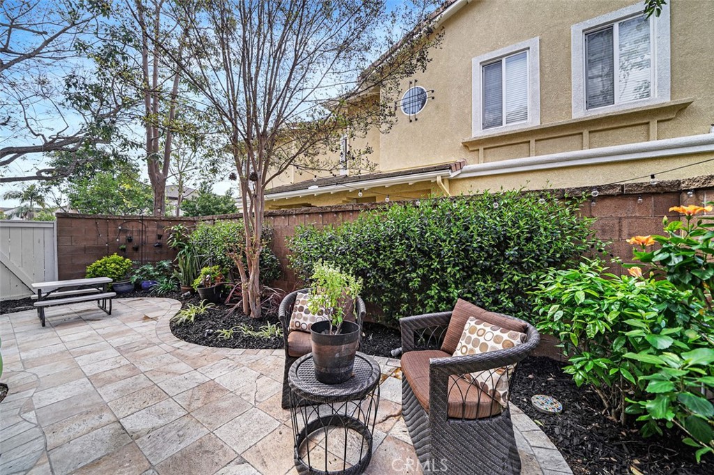 12 Geranium Irvine, CA 92618 - Photo 18 of 20 a backyard of a house with seating space