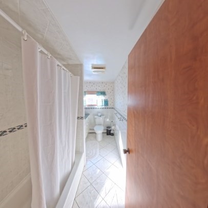 9 Raymond Street, Unit 1 Boston, MA 02134 - Photo 15 of 17 a bathroom with a sink and a mirror
