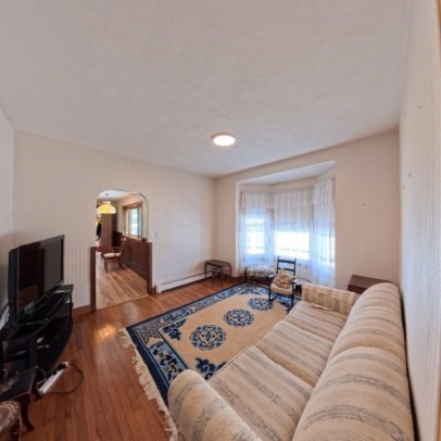 9 Raymond Street, Unit 1 Boston, MA 02134 - Photo 4 of 17 a living room with furniture and a flat screen tv