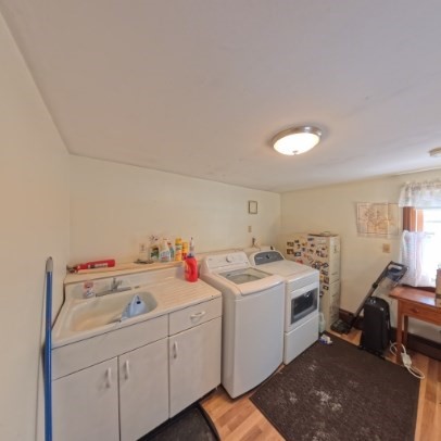 9 Raymond Street, Unit 1 Boston, MA 02134 - Photo 7 of 17 a utility room with dryer and washer