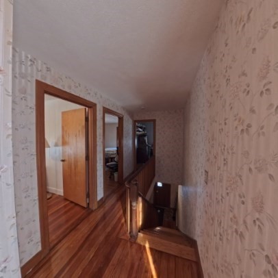 9 Raymond Street, Unit 1 Boston, MA 02134 - Photo 10 of 17 a view of a hallway with wooden floor
