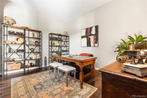 a reading room with furniture and book shelf