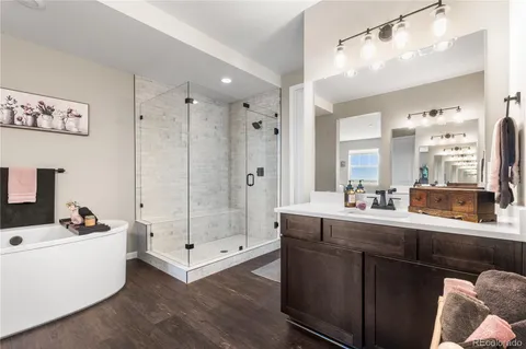 a very nice looking room with a large window and chandelier