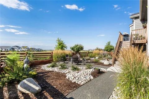 a view of a yard with patio