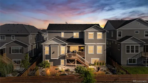 a front view of a house with yard