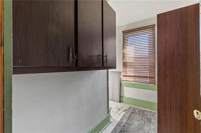 a view of a bathroom with a glass door