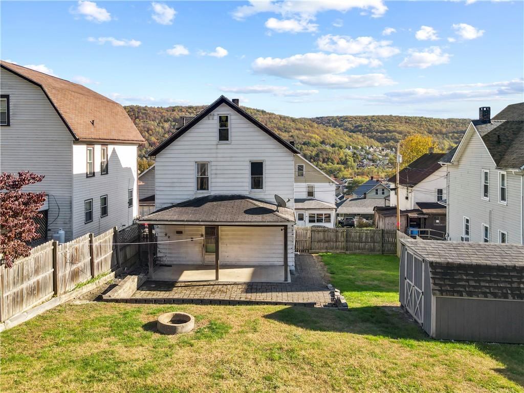 244 5th Street Johnstown, PA 15909 - Photo 3 of 36 a view of a house with swimming pool and furniture