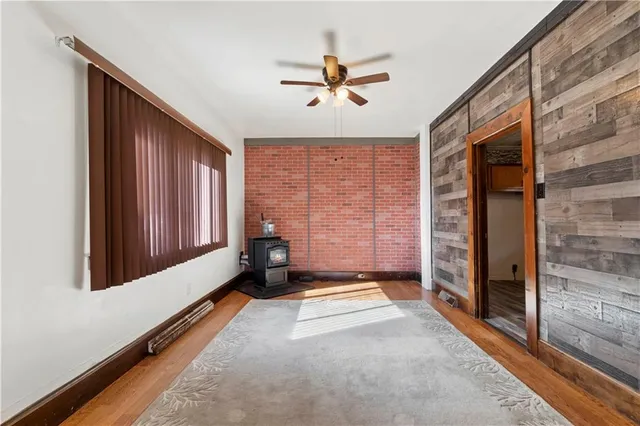 a view of an empty room and a window