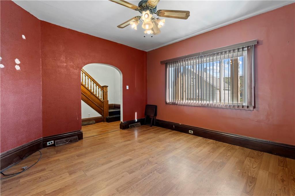 244 5th Street Johnstown, PA 15909 - Photo 10 of 36 an empty room with windows and ceiling fan