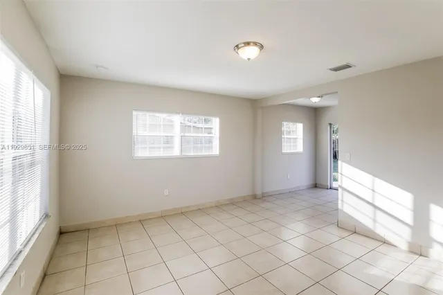 a view of an empty room with window