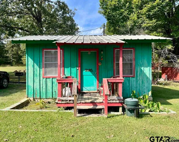 a view of a swimming pool with an outdoor space