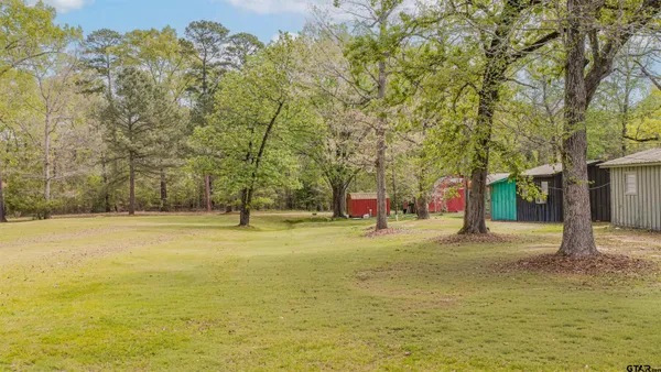 a house with swimming pool in front of it
