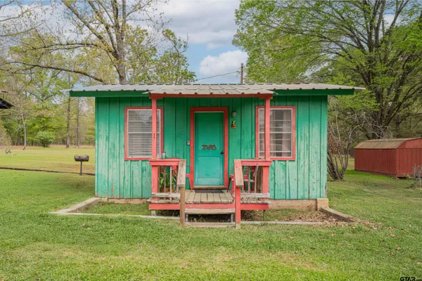 a view of a chair in the house