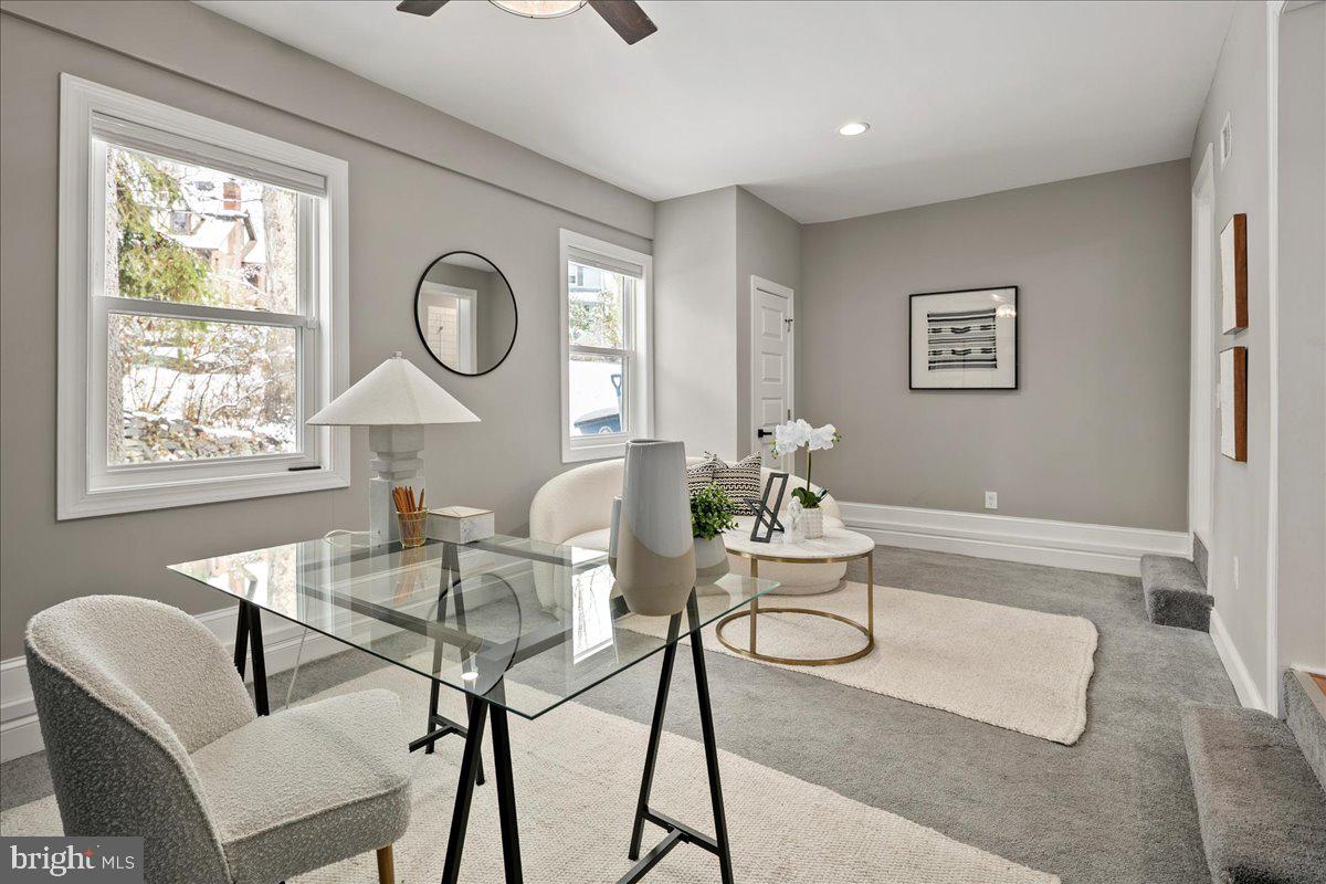 111 Sunnyside Road Silver Spring, MD 20910 - Photo 18 of 44 a living room with furniture and a window