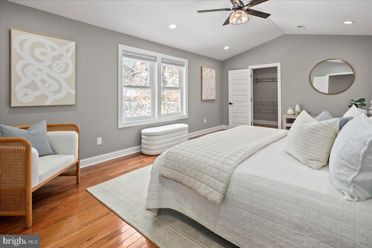 111 Sunnyside Road Silver Spring, MD 20910 - Photo 24 of 44 a bedroom with a bed couch and window