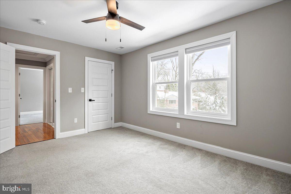 111 Sunnyside Road Silver Spring, MD 20910 - Photo 31 of 44 a view of an empty room with a window