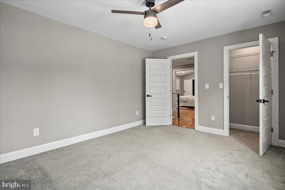 111 Sunnyside Road Silver Spring, MD 20910 - Photo 34 of 44 a view of empty room with ceiling fan