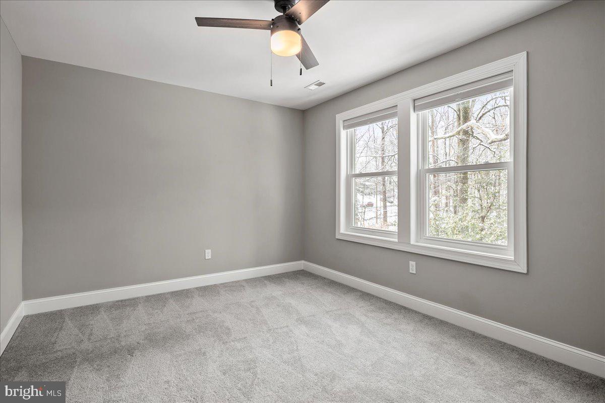 111 Sunnyside Road Silver Spring, MD 20910 - Photo 35 of 44 a view of an empty room with a window