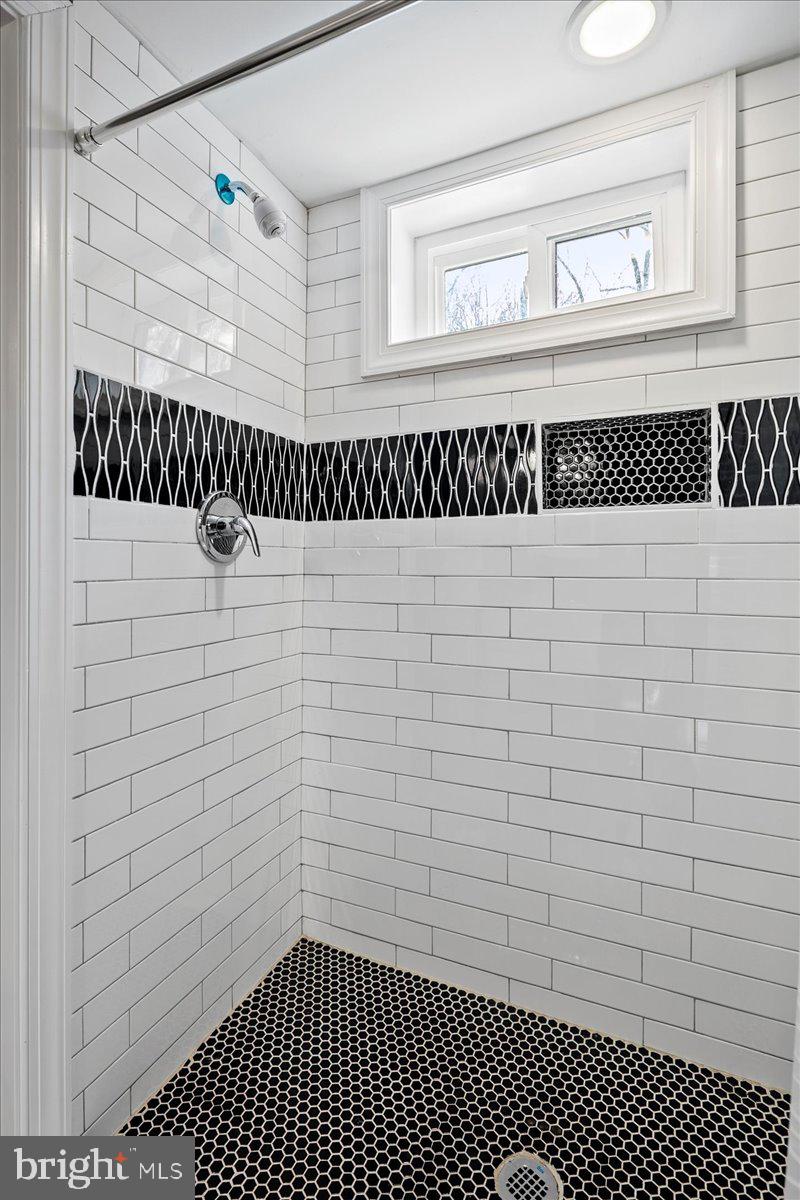 111 Sunnyside Road Silver Spring, MD 20910 - Photo 40 of 44 a bathroom with a shower