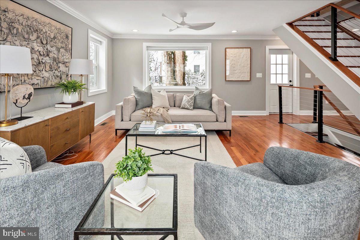 111 Sunnyside Road Silver Spring, MD 20910 - Photo 6 of 44 a living room with furniture rug and a window