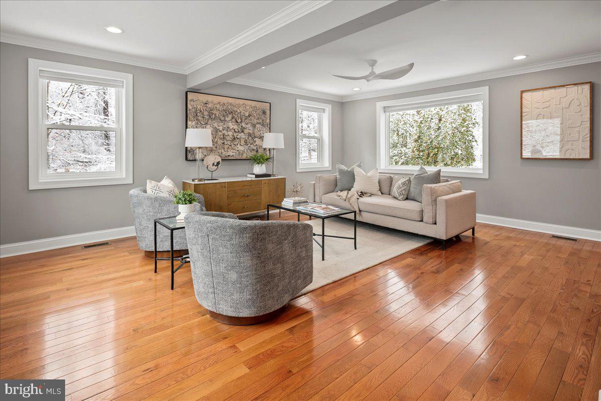 111 Sunnyside Road Silver Spring, MD 20910 - Photo 7 of 44 a living room with furniture and a large window