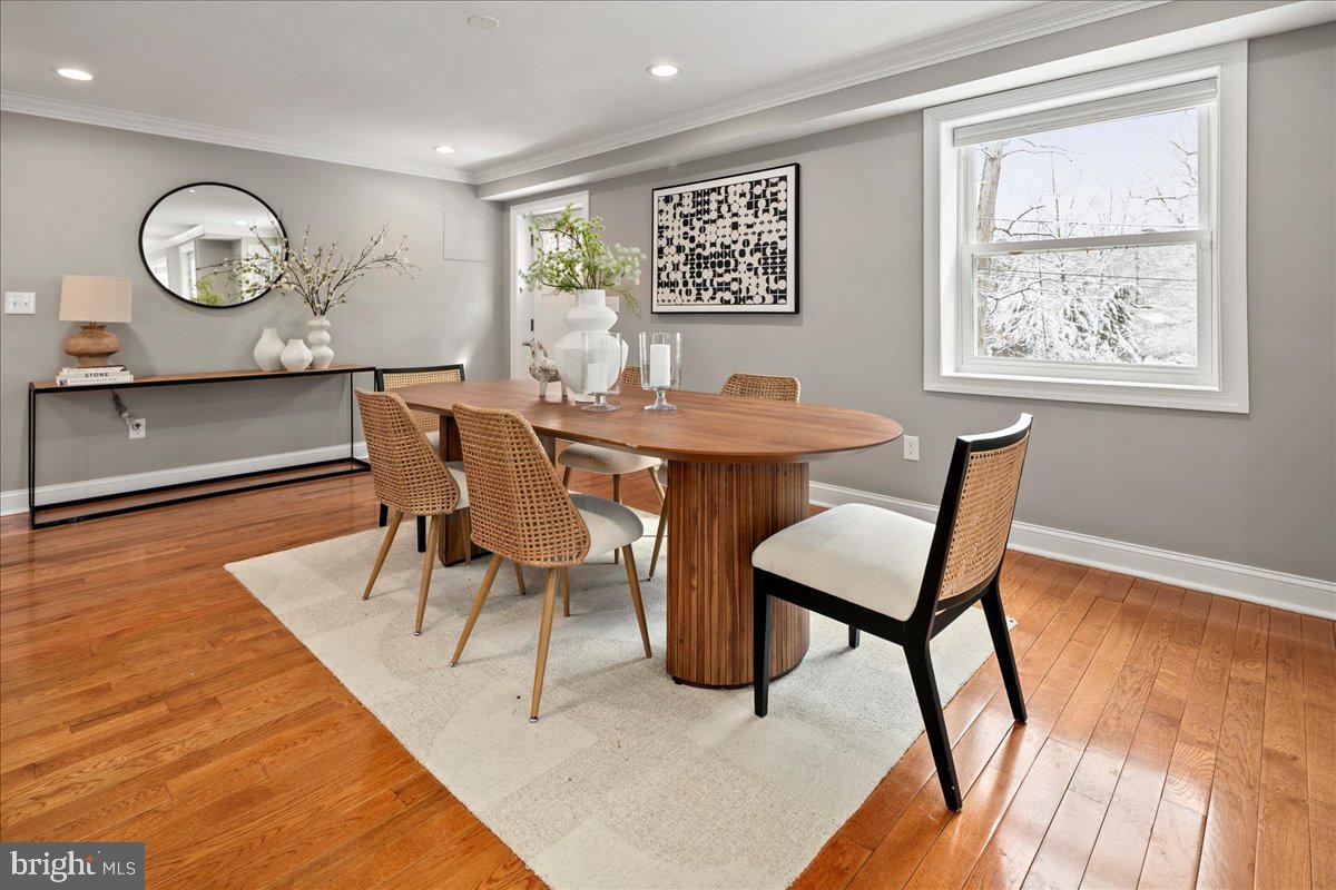 111 Sunnyside Road Silver Spring, MD 20910 - Photo 10 of 44 a view of a dining room with furniture and wooden floor