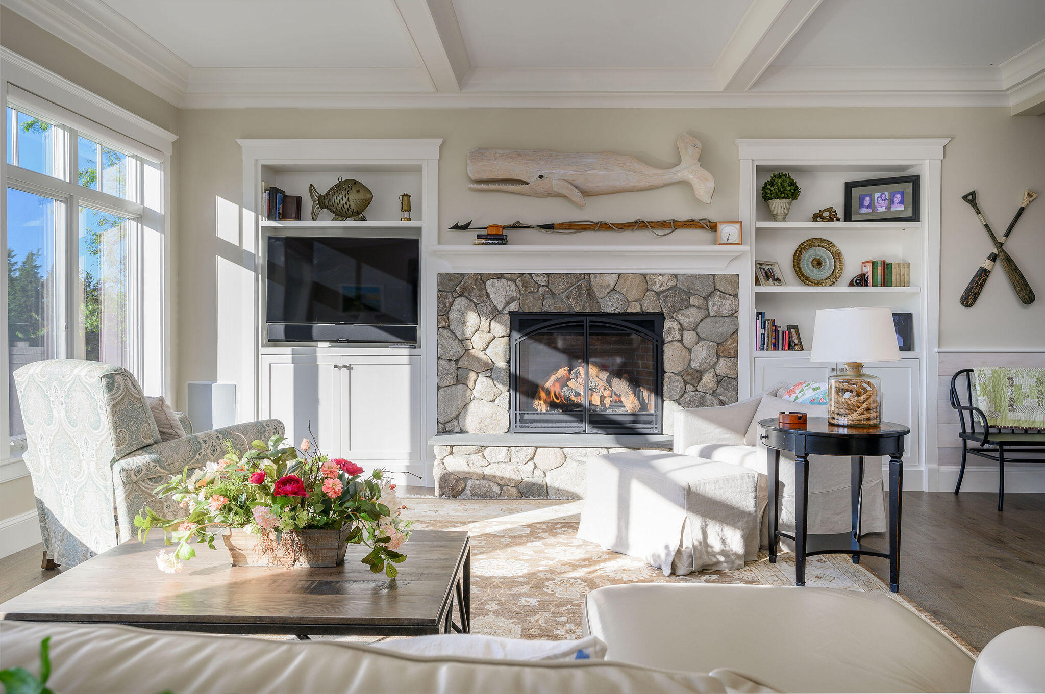 111 Harris Meadow Lane Barnstable, MA 02630 - Photo 12 of 56 a living room with furniture and a fireplace