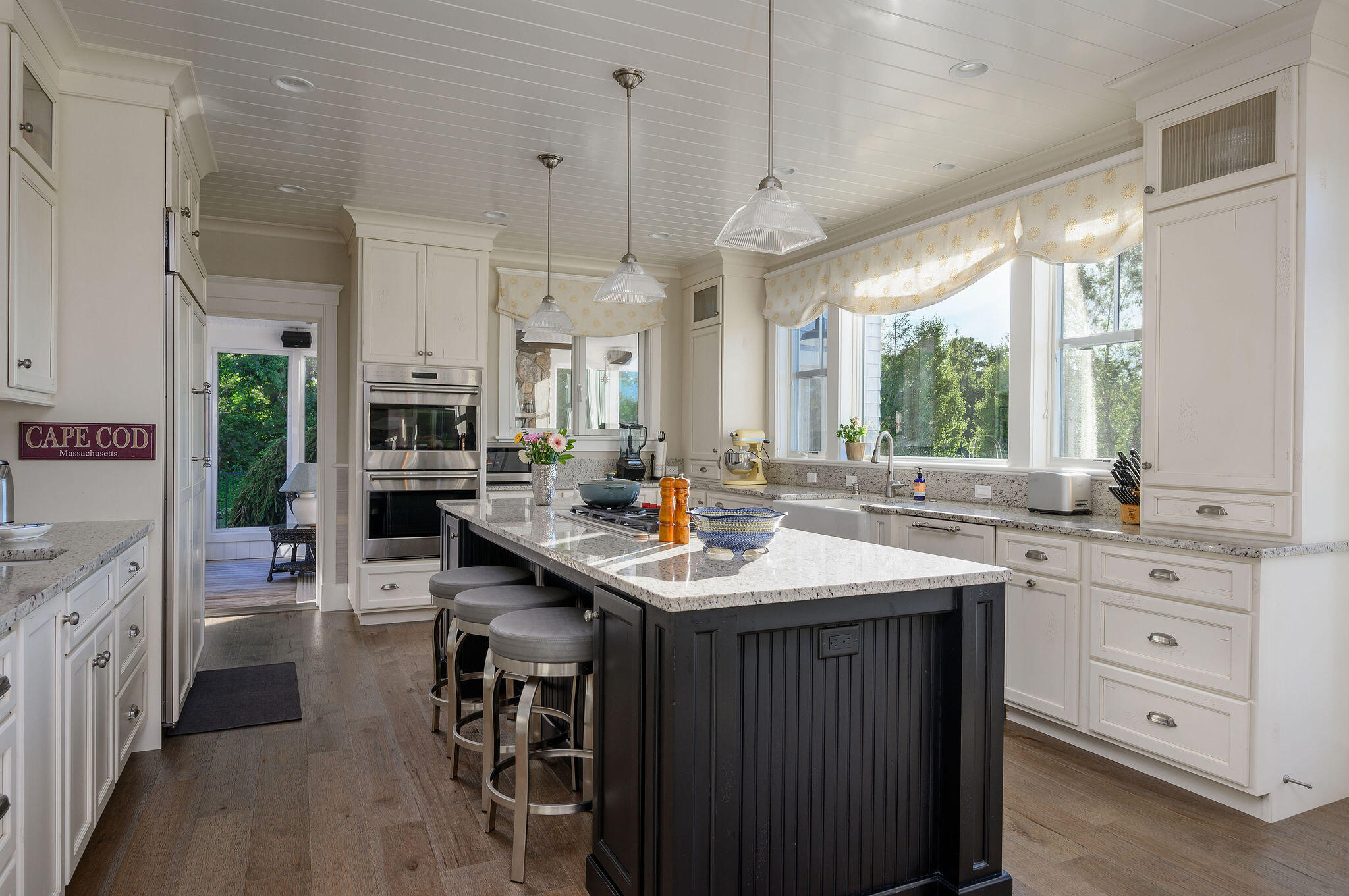 111 Harris Meadow Lane Barnstable, MA 02630 - Photo 16 of 56 a kitchen with lots of counter space a sink appliances and a large window