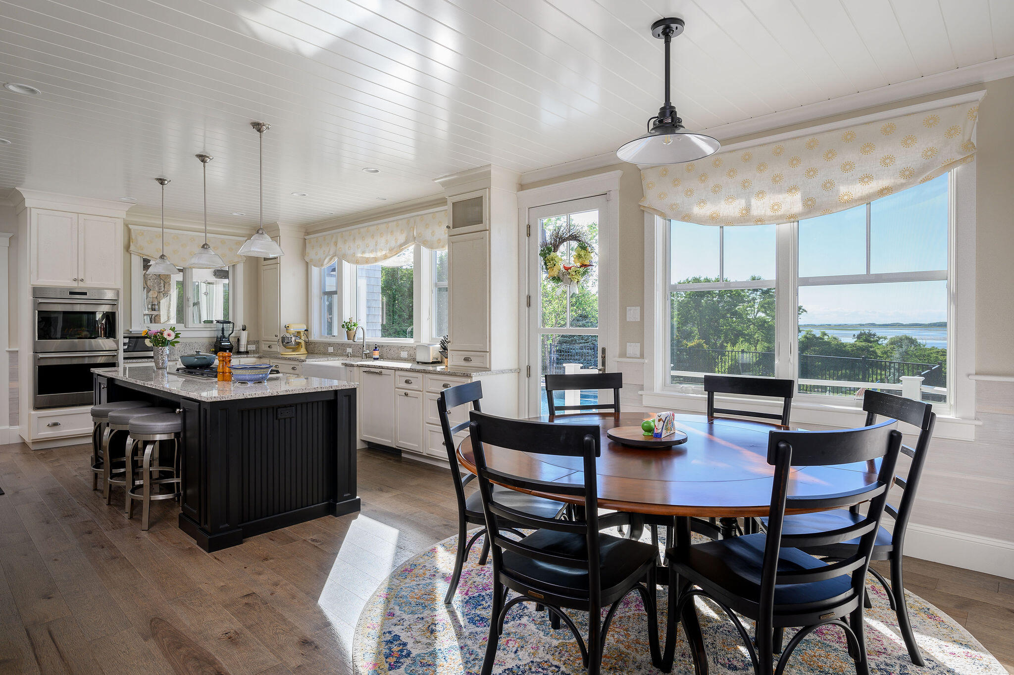 111 Harris Meadow Lane Barnstable, MA 02630 - Photo 21 of 56 a view of a dining room with furniture window and outside view