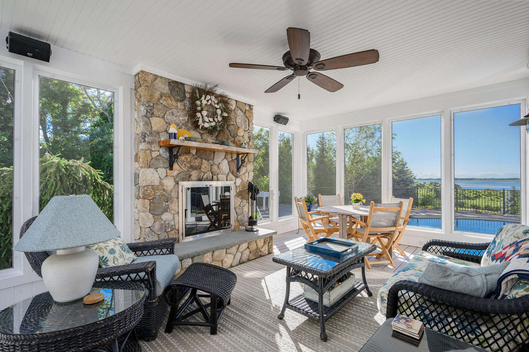 111 Harris Meadow Lane Barnstable, MA 02630 - Photo 25 of 56 a living room with furniture and a fireplace