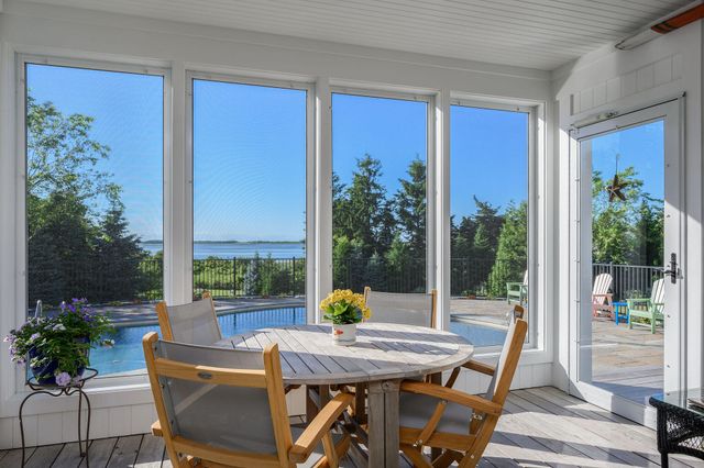 a bathroom with a sink a vanity and a mirror
