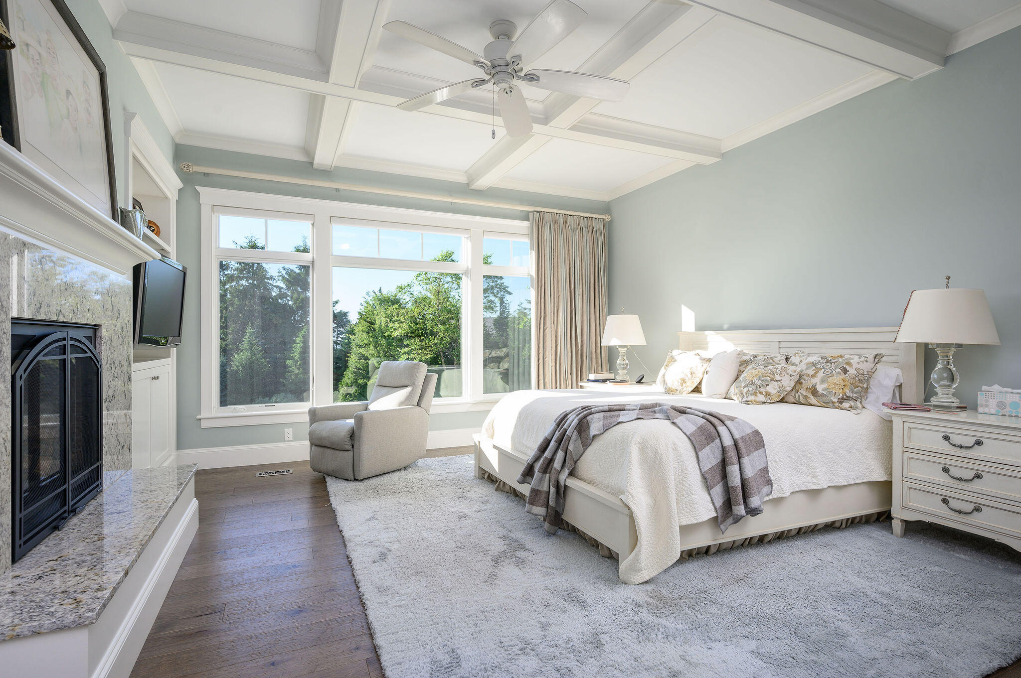 111 Harris Meadow Lane Barnstable, MA 02630 - Photo 29 of 56 a spacious bedroom with a large bed and a fireplace