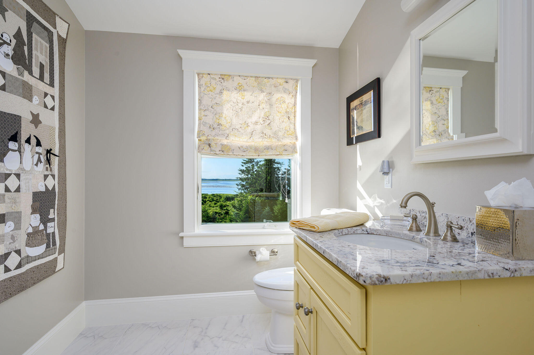 111 Harris Meadow Lane Barnstable, MA 02630 - Photo 37 of 56 a bathroom with a granite countertop sink a toilet and a window
