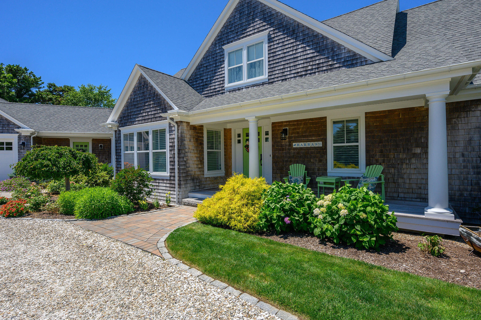 111 Harris Meadow Lane Barnstable, MA 02630 - Photo 4 of 56 front view of a house with a yard