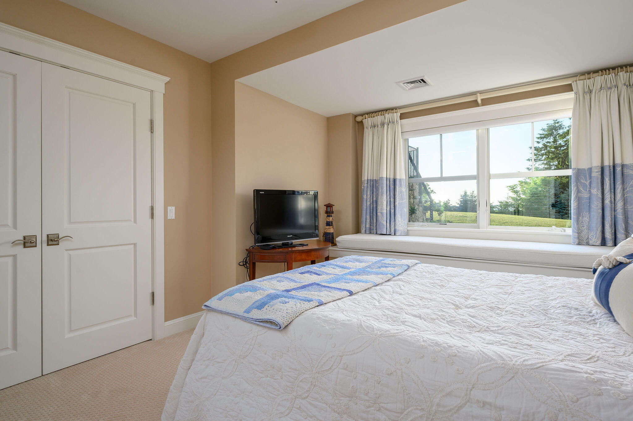 111 Harris Meadow Lane Barnstable, MA 02630 - Photo 45 of 56 a bedroom with a bed and a television