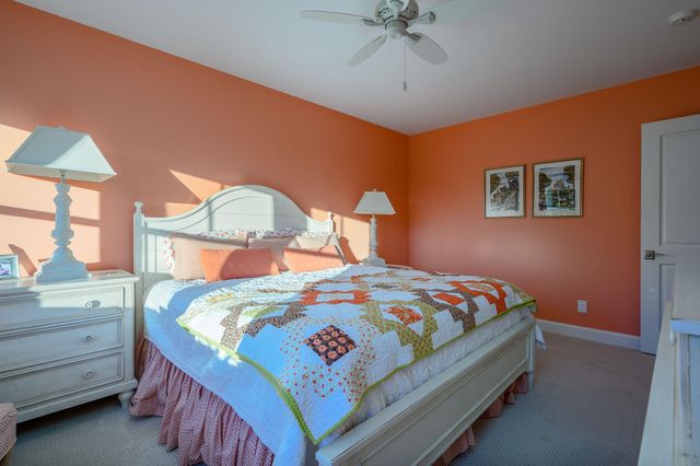 an aerial view of residential house with outdoor space and swimming pool