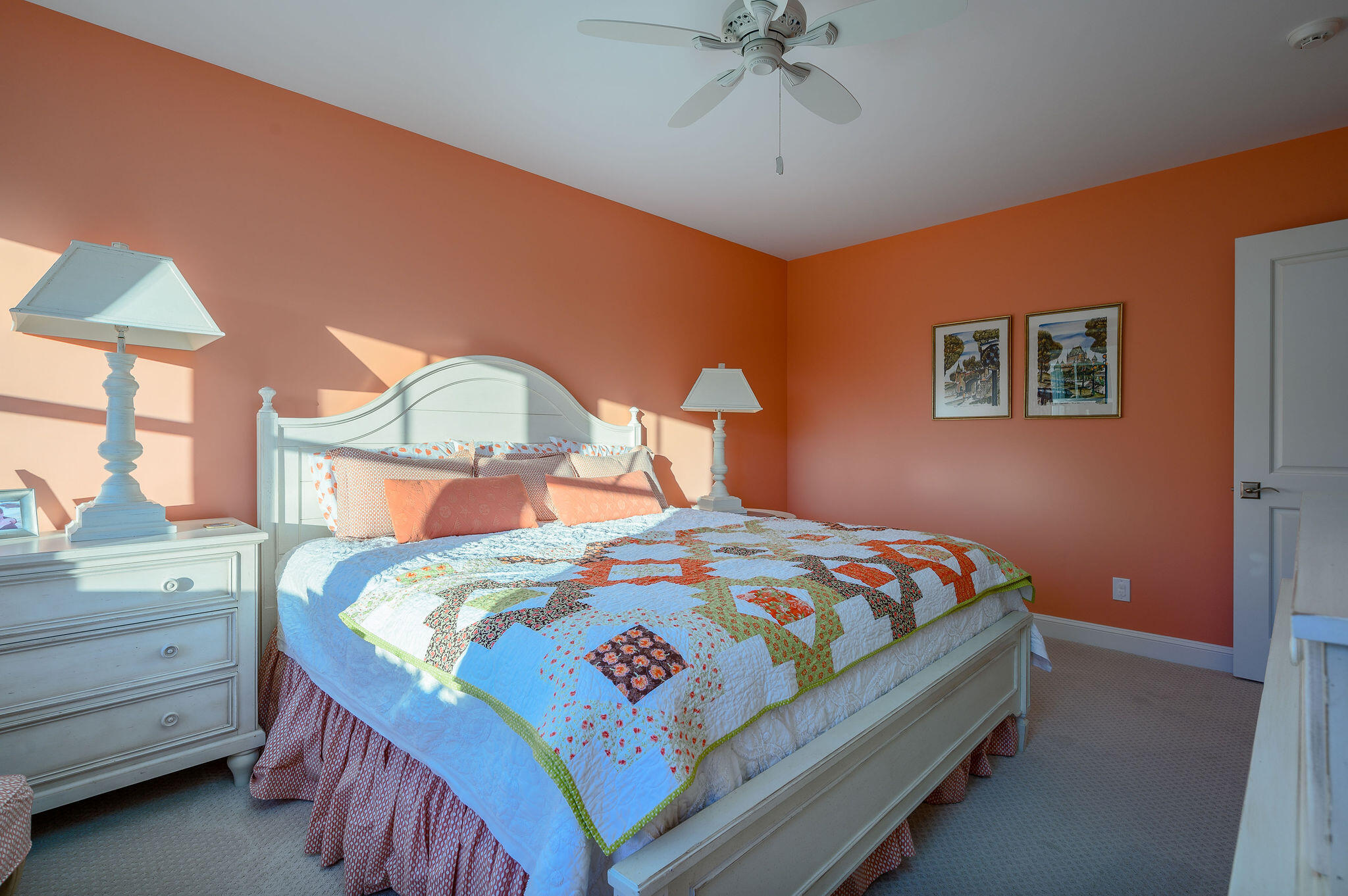 111 Harris Meadow Lane Barnstable, MA 02630 - Photo 47 of 56 a bedroom with a bed and a chandelier