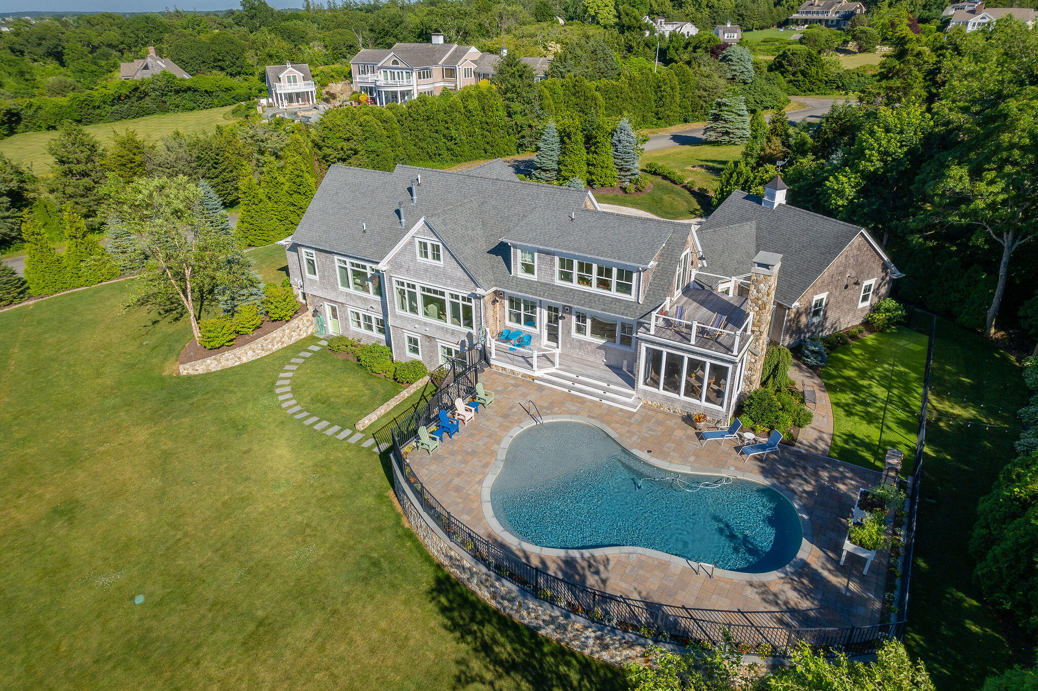 111 Harris Meadow Lane Barnstable, MA 02630 - Photo 5 of 56 an aerial view of residential houses with outdoor space and swimming pool